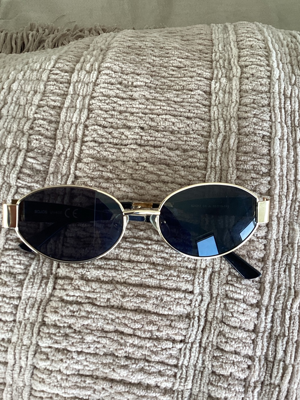 Gold Frame Oval Sunglasses with Dark Lenses by dojos